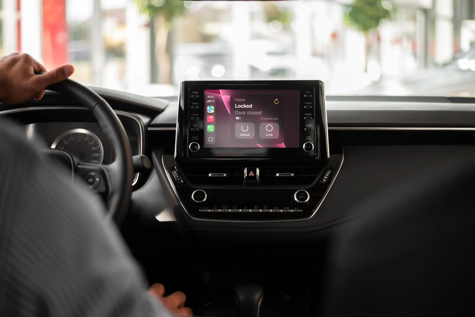 A Car Display with Apple Car Play showing the Nuki Widget to open your Door from the car.